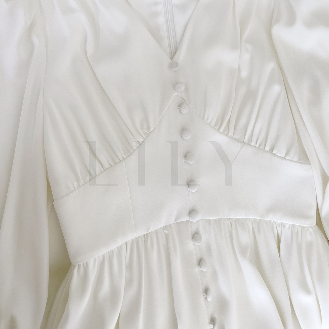 Ivory Buttoned Elegance
