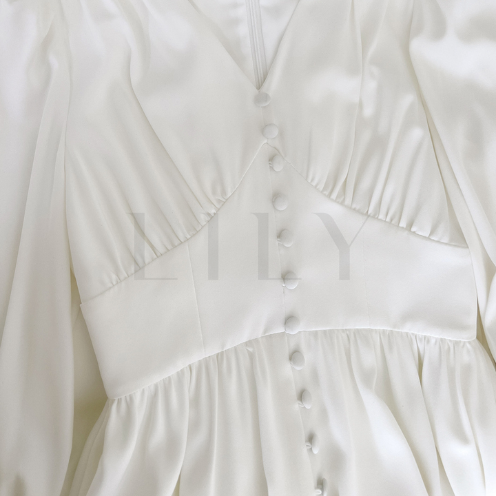 Ivory Buttoned Elegance