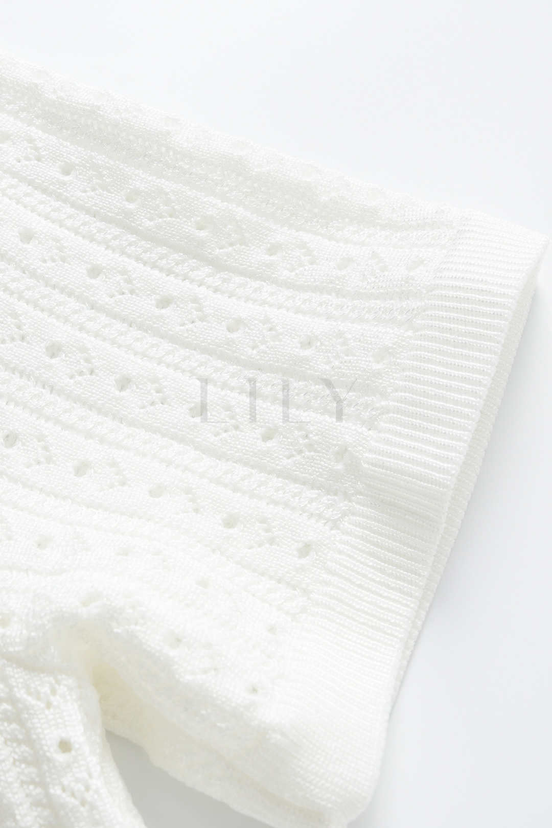 Capri Pearl Viscose knit Hollow Mini Dress