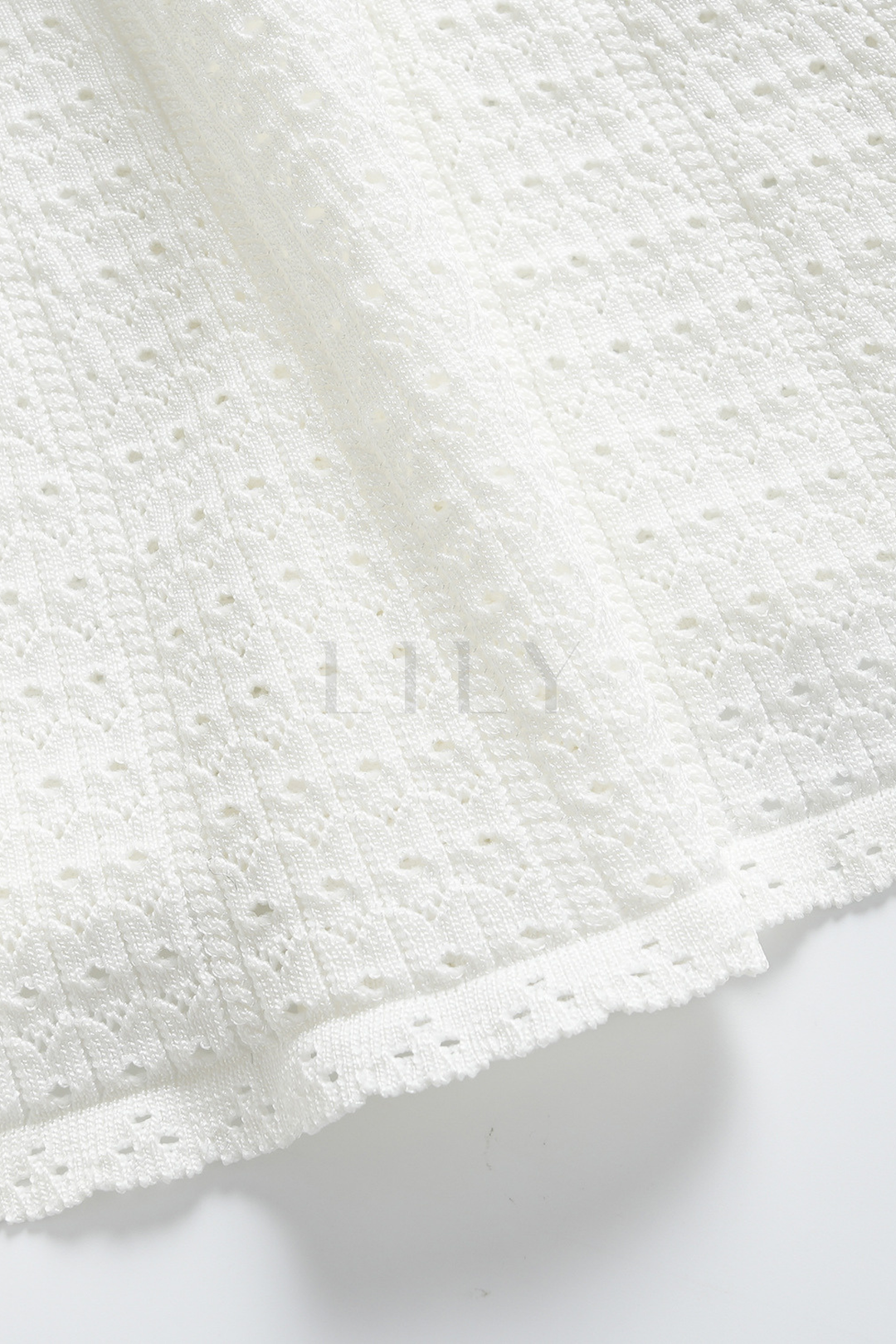 Capri Pearl Viscose knit Hollow Mini Dress