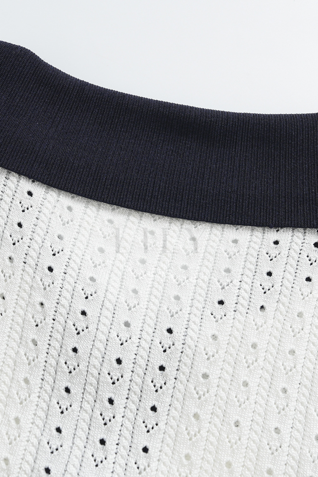 Capri Pearl Viscose knit Hollow Mini Dress